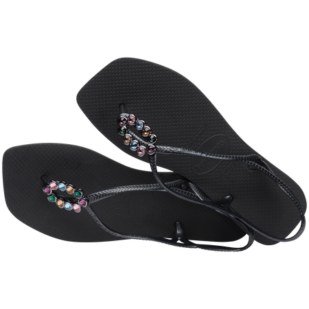 Women's black sandal featuring oval with multicolor crystal details alternate top view