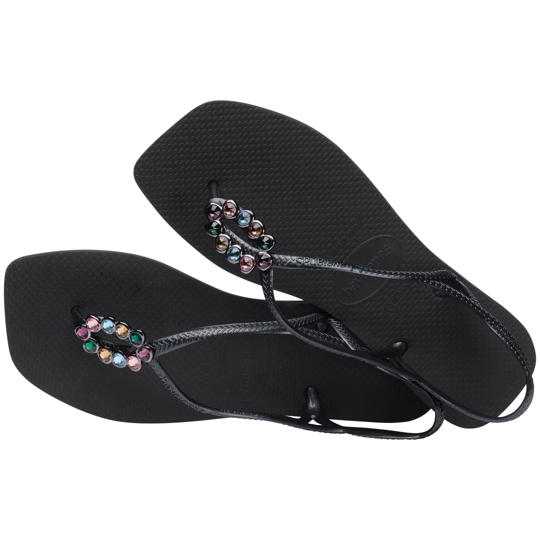 Women's black sandal featuring oval with multicolor crystal details alternate top view