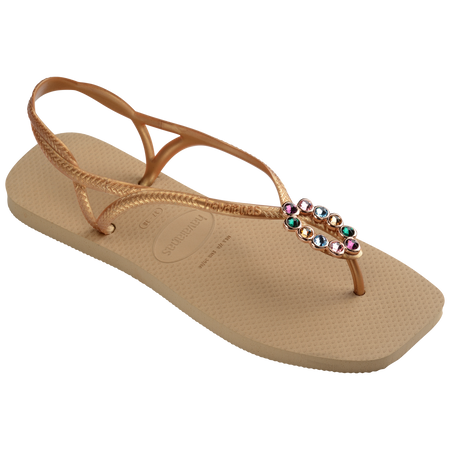 Women's tan sandal with oval multicolor crystal decoration and gold straps, right 3/4 view