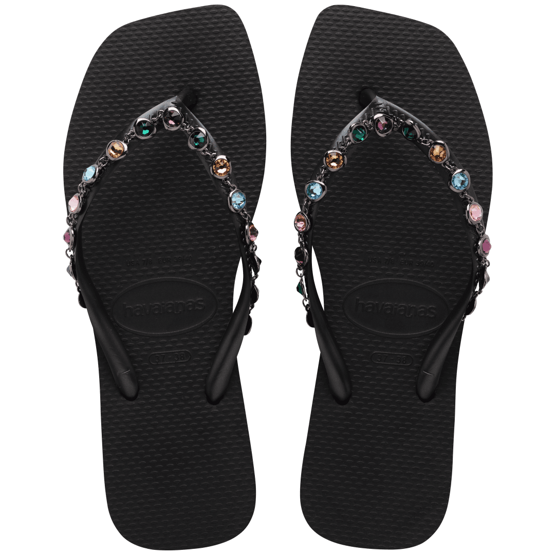 Women's square toe black flip flop with multicolor gems on straps top view