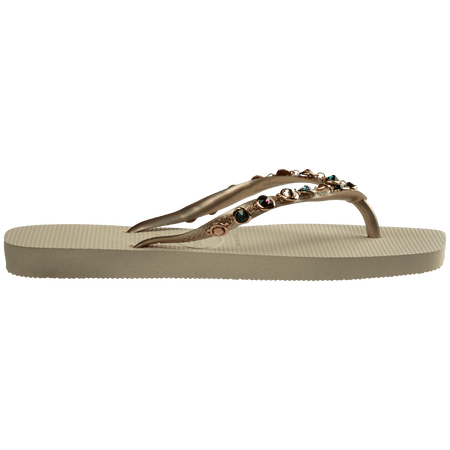 Women's square toe cream flip flops and gold straps with multicolor crystals, side view