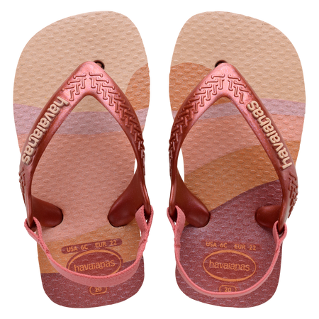 Baby flip flops with backstrap, abstract pink, beige and orange print with metallic pink straps, top view