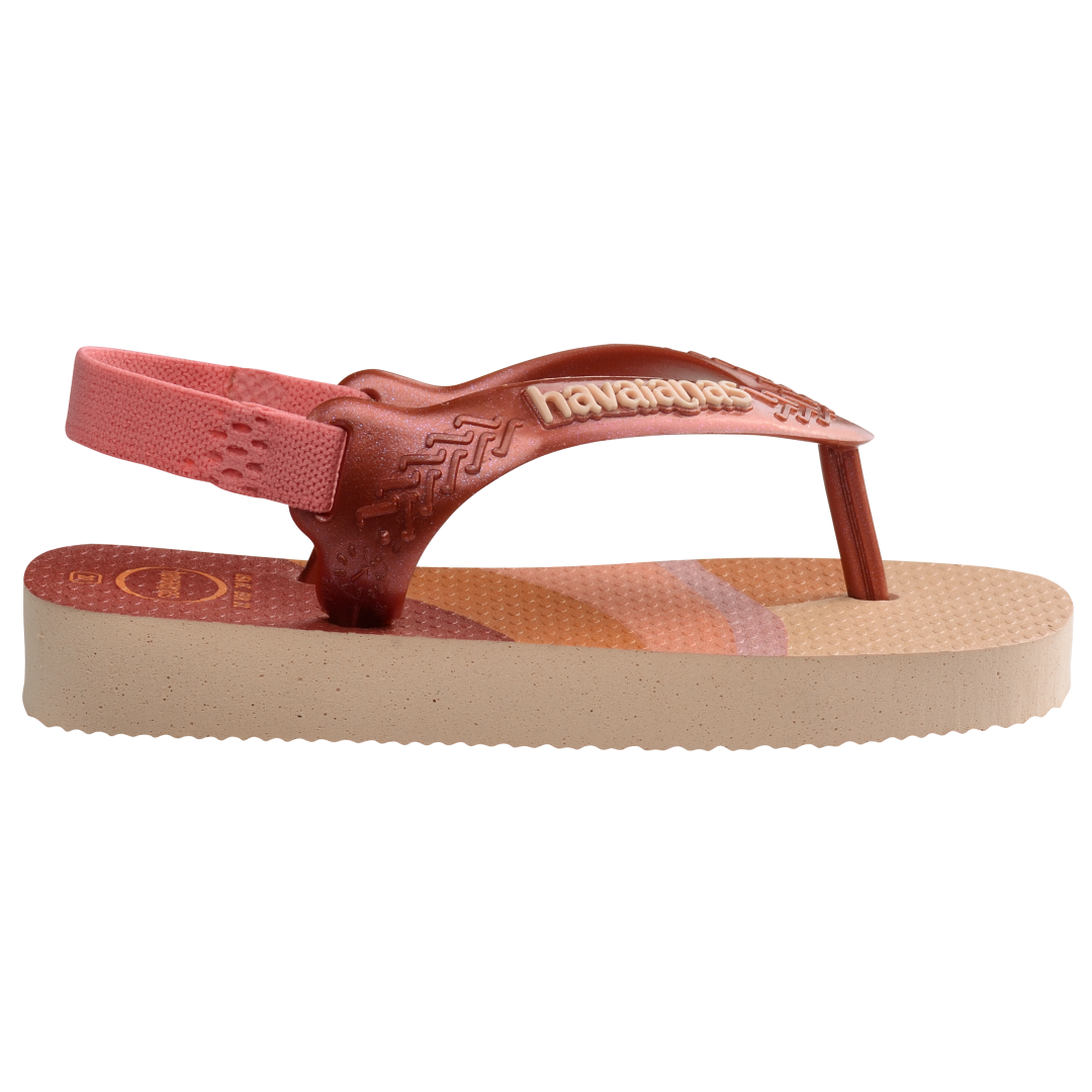 Baby flip flops with backstrap, abstract pink, beige and orange print with metallic pink straps, side view