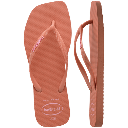 square-toe flip flop in orange color with pink havaianas logo on the strap, one top facing and one flip flop on the side