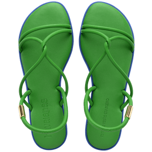 Green strappy sandal with blue sole top view