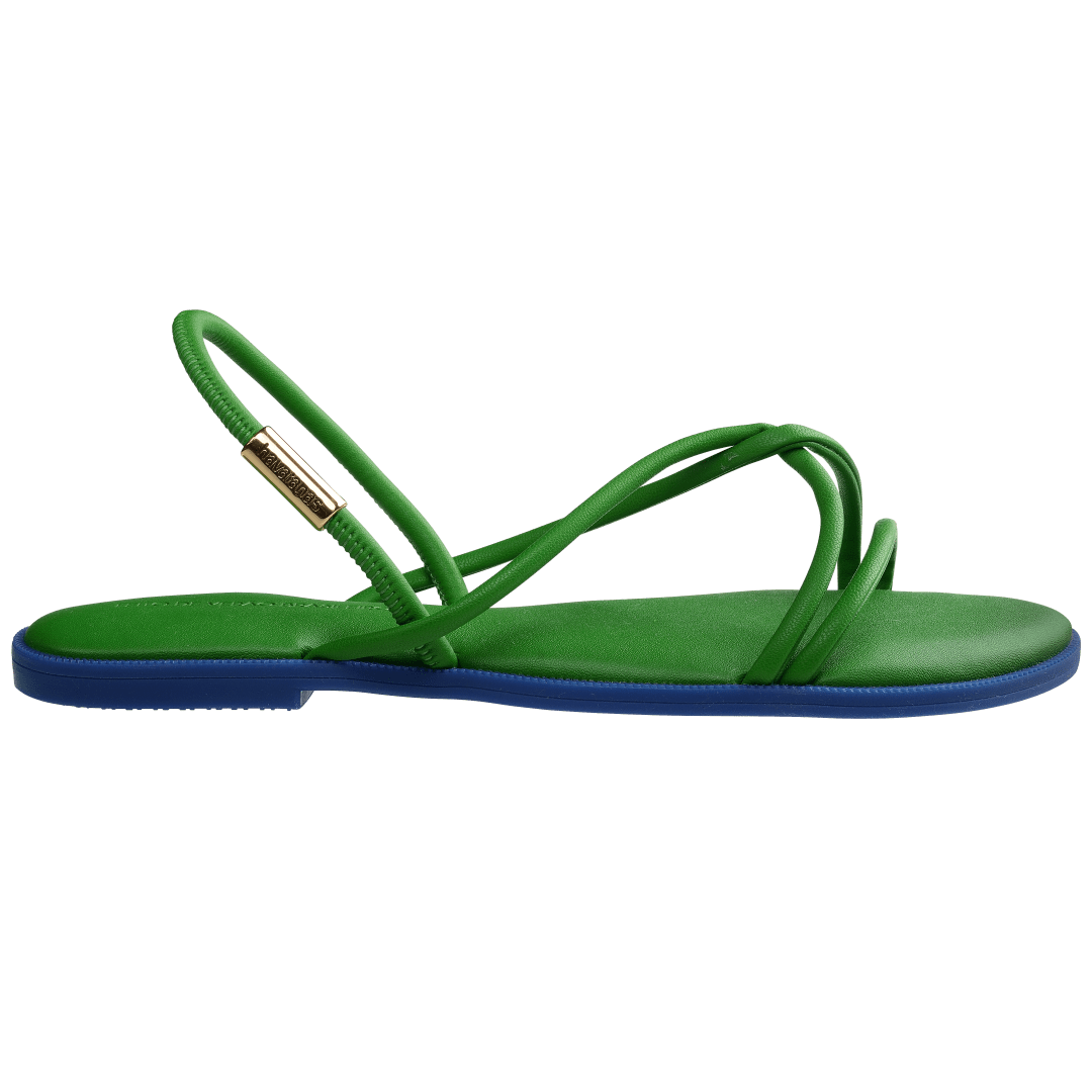 Green strappy sandal with blue sole side view