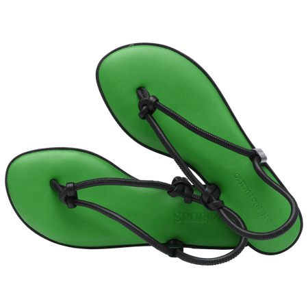 Women's green sole sandal with black straps alternate top view