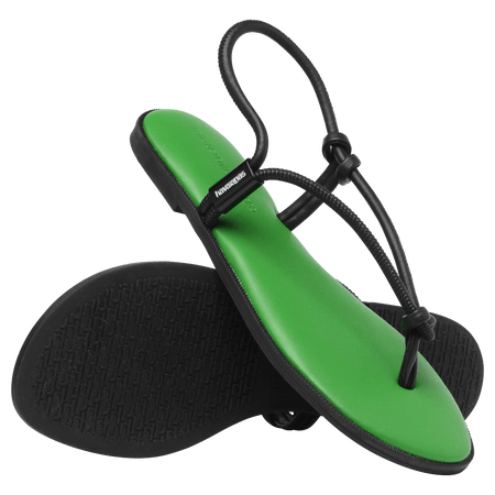 Women's green sole sandal with black straps and black sole