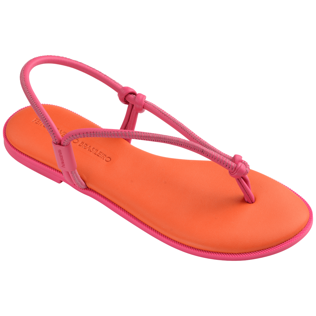 Women's orange sandal with contrast pink straps and sole 3/4 side view