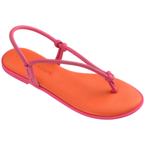 Women's orange sandal with contrast pink straps and sole 3/4 side view