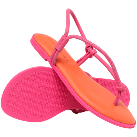 Women's orange sandal with contrast pink straps and sole crisscross view