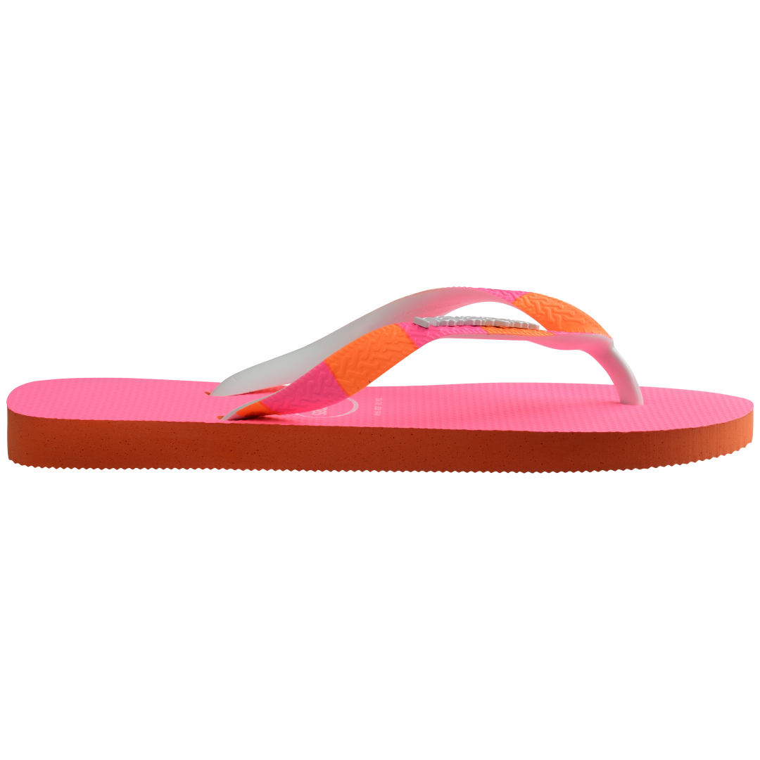 Women's neon pink flip flop with orange and pink striped straps side view