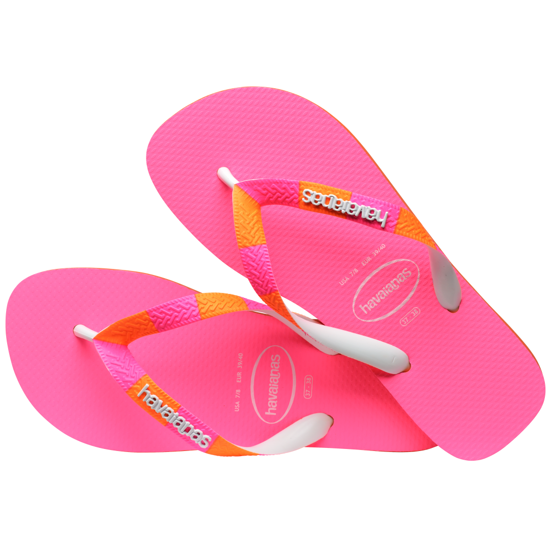 Women's neon pink flip flop with orange and pink striped straps alternate top view