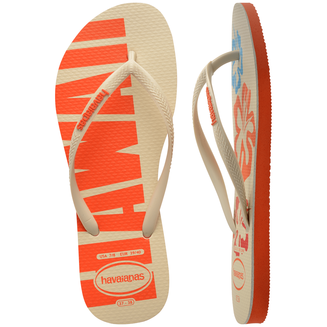 Women's cream flip flop with blue, orange and red flowers and orange printed Hawaii on the left foot top and side view showing orange sole