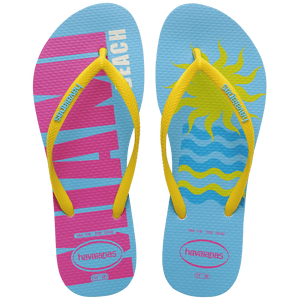 Women's light blue flip flops with yellow straps and pink Miami print on the left foot and yellow sun and blue waves print on the right foot top view