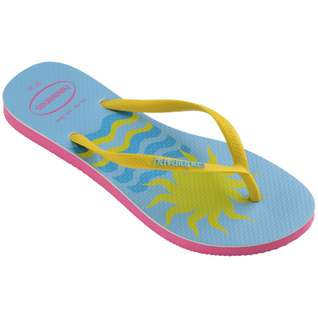 Women's light blue flip flops with yellow straps and pink Miami print on the left foot and yellow sun and blue waves print on the right foot 3/4 side view showing pink sole