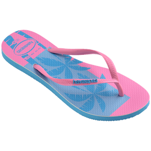 Women's bright pink and blue flip flop with Los Angeles printed on left footbed and palm trees on the right footbed, blue contrast sole, 3/4 side view