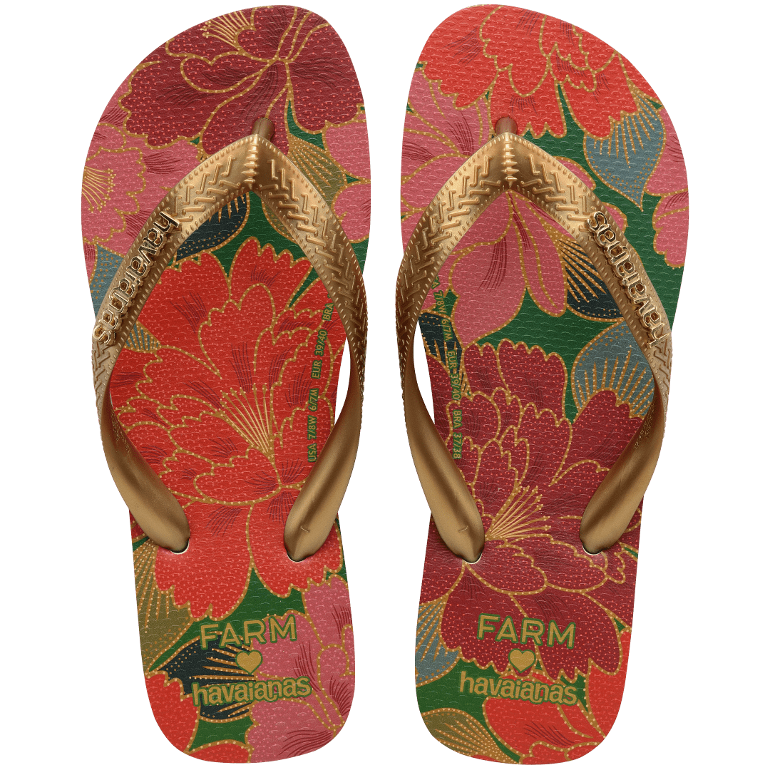 Women's FARM Rio x Havaianas flip flops with red floral print and gold straps top view