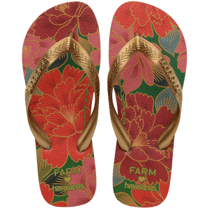 Women's FARM Rio x Havaianas flip flops with red floral print and gold straps top view