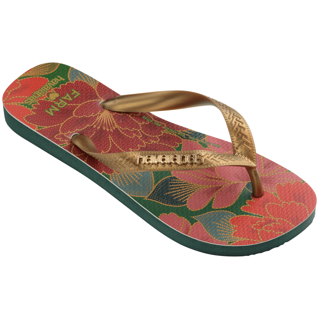 Women's FARM Rio x Havaianas flip flops with red floral print and gold straps 3/4 side view