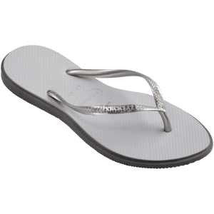 light grey sandals with darker grey outline around footbed, with metallic grey straps and a silver metal havaianas logo on the strap, front right view