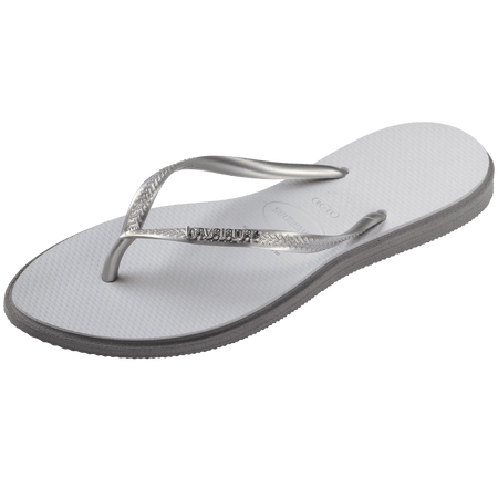 light grey sandals with darker grey outline around footbed, with metallic grey straps and a silver metal havaianas logo on the strap, front left view