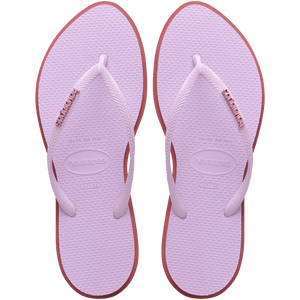 Women's light purple pointed toe flip flops with red contrast sole, top view