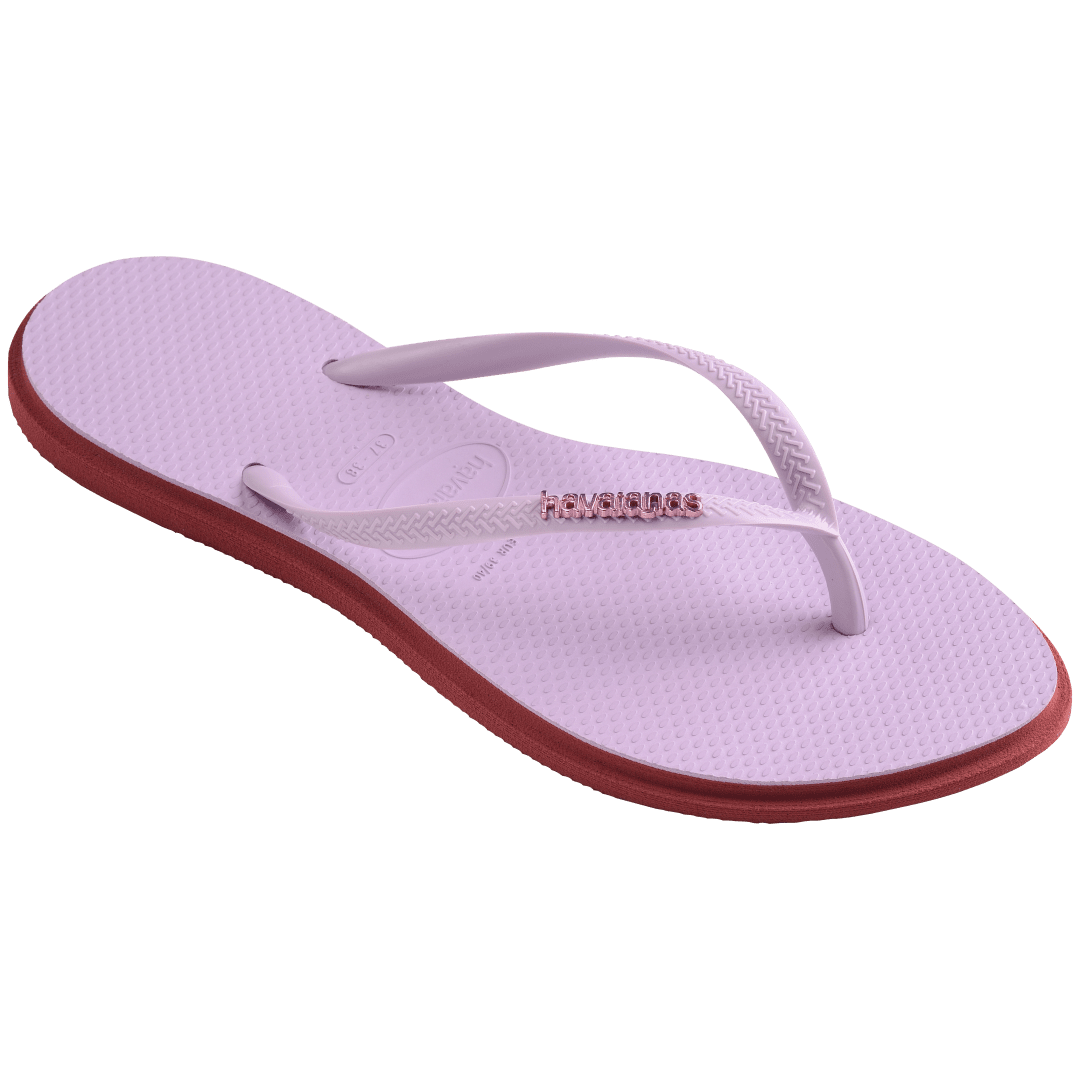 Women's light purple pointed toe flip flops with red contrast sole, right 3/4 view