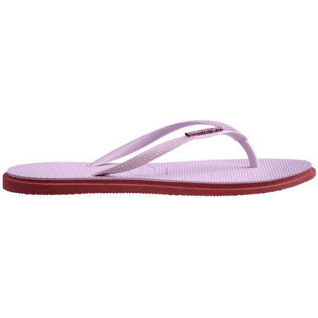 Women's light purple pointed toe flip flops with red contrast sole, side view