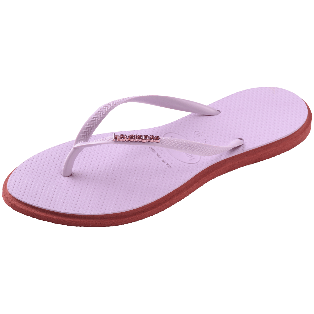 Women's light purple pointed toe flip flops with red contrast sole, left 3/4 view