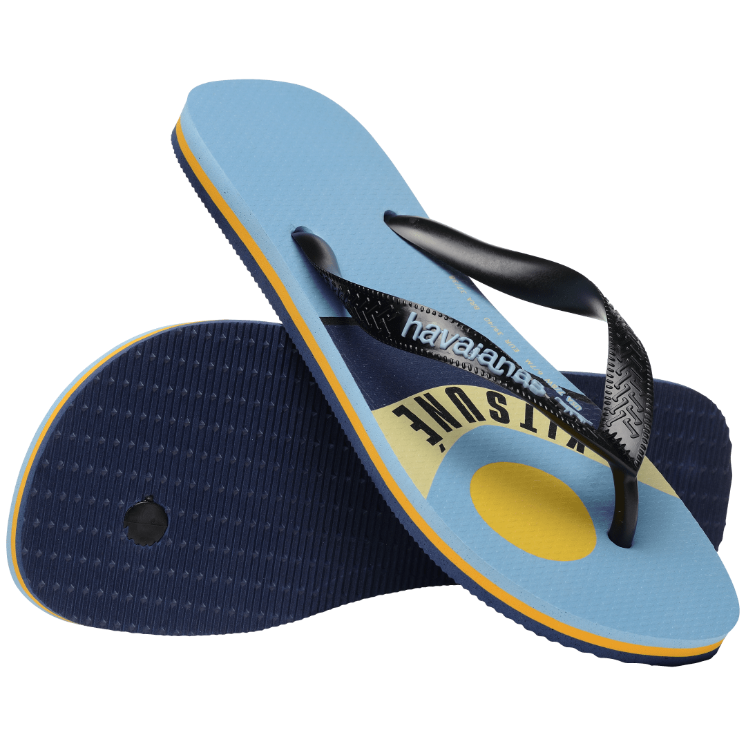 Unisex Maison Kitsune x Havaianas light blue flip flop with wave print and black straps, top and sole view