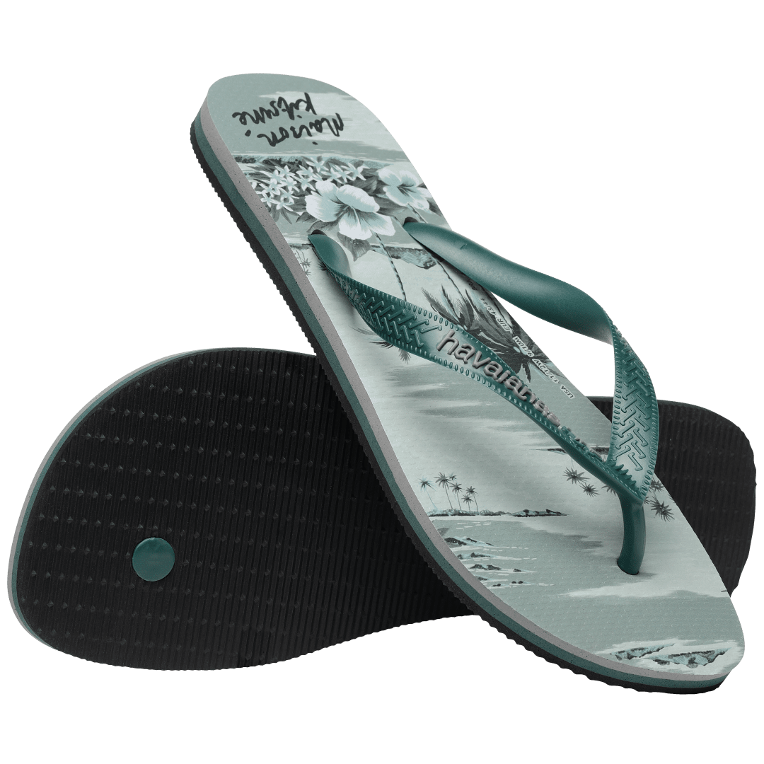 Maison Kitsune x Havaianas teal tonal tropical print flip flops with dark green straps, top and sole view