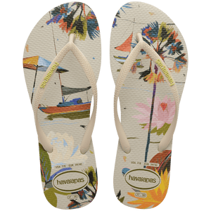 Women's boat, beach umbrella and floral print multi colored flip flop top view