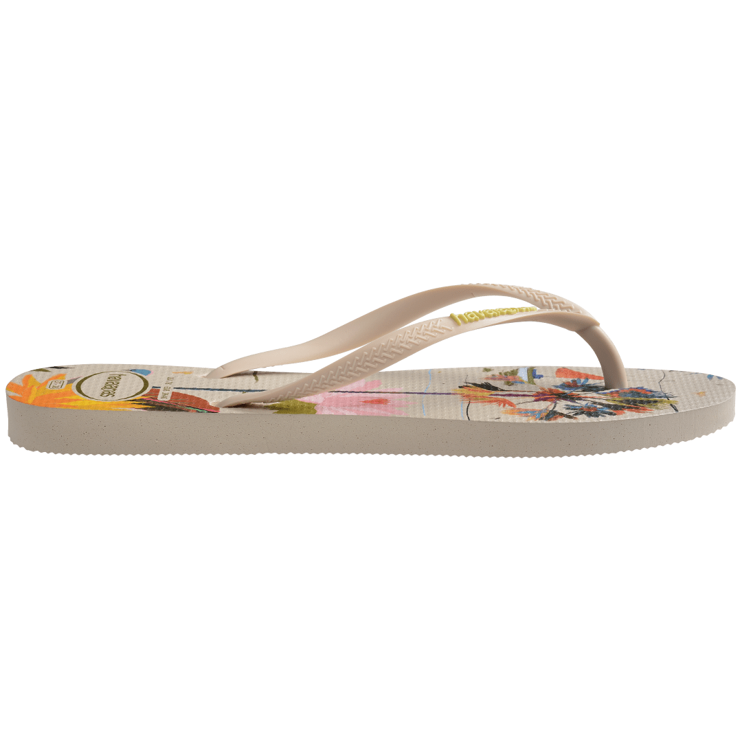 Women's boat, beach umbrella and floral print multi colored flip flop side view