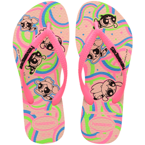 Powerpuff Girls flying on a neon green, blue, and pink background sole of flip flops, with pink straps with black Havaianas logo, top view