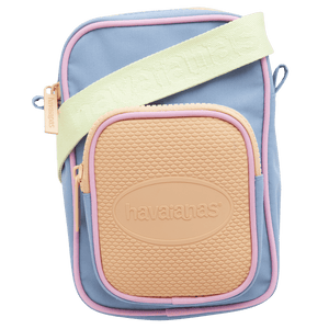 lilac crossbody bag with pink trim, orange front pocket, and light green strap, zoomed in view