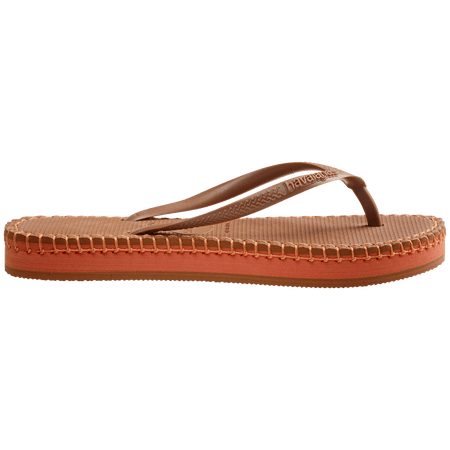 brown flip flops with orange stitching around the sole, and orange midlayer between the sole and bottom of shoe, side view