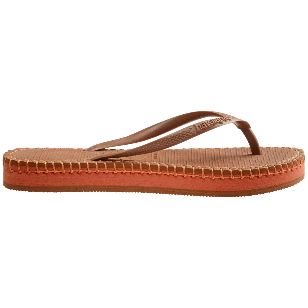 brown flip flops with orange stitching around the sole, and orange midlayer between the sole and bottom of shoe, side view