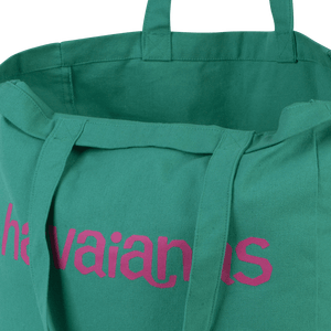 Green tote bag with Havaianas logo close up