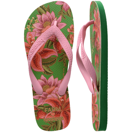 flip flops with green sole featuring pink flowers and pink straps, one top facing and one side facing